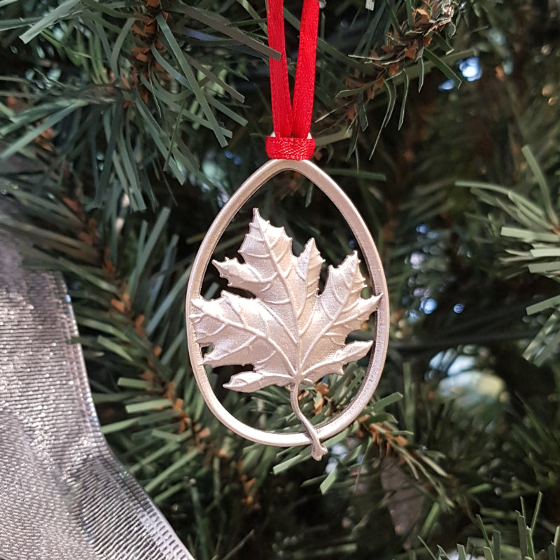 pewter maple leaf ornament on christmas tree canada ornament