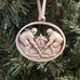 pewter hockey ornament on christmas tree