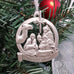 pewter nativity ornament on christmas tree joy to the world ornament