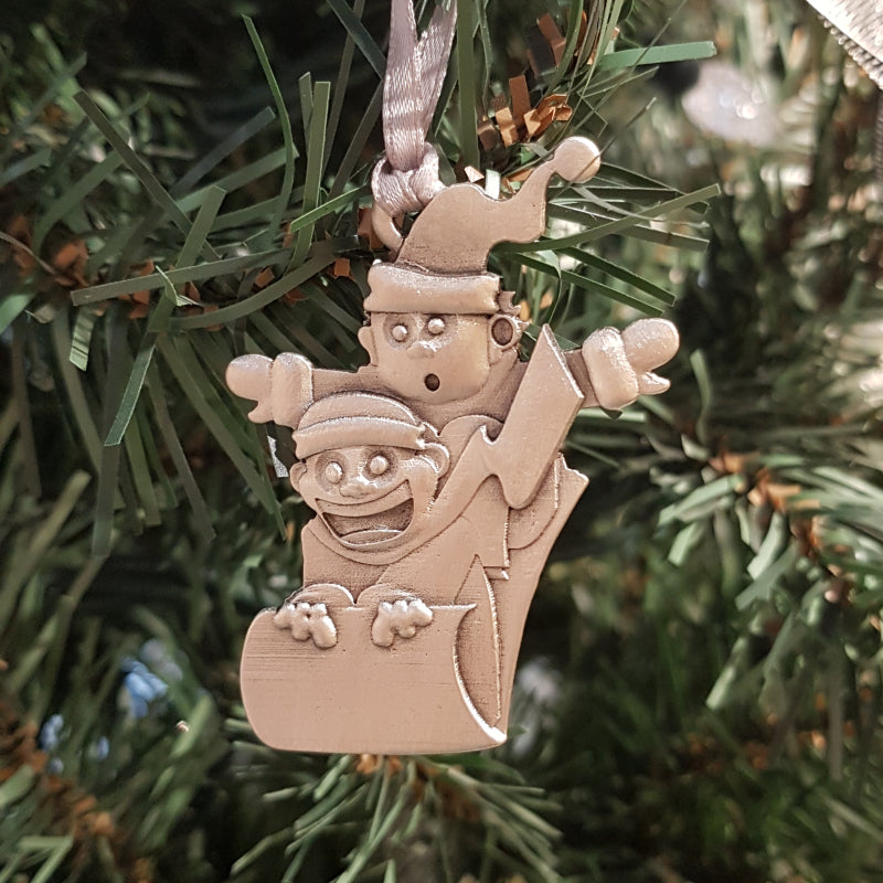 pewter sled ornament on christmas tree