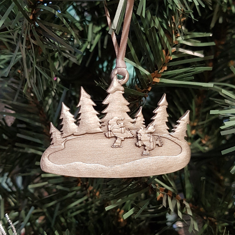 pewter skater ornament on christmas tree