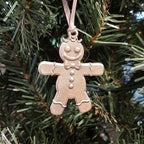 pewter gingerbread ornament on christmas tree