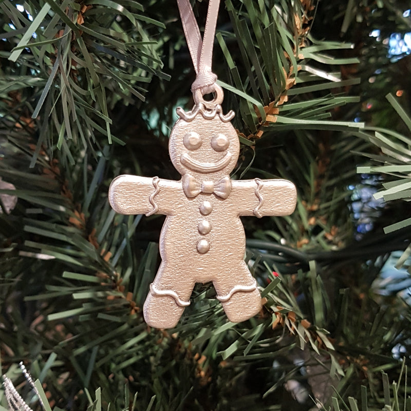 pewter gingerbread ornament on christmas tree