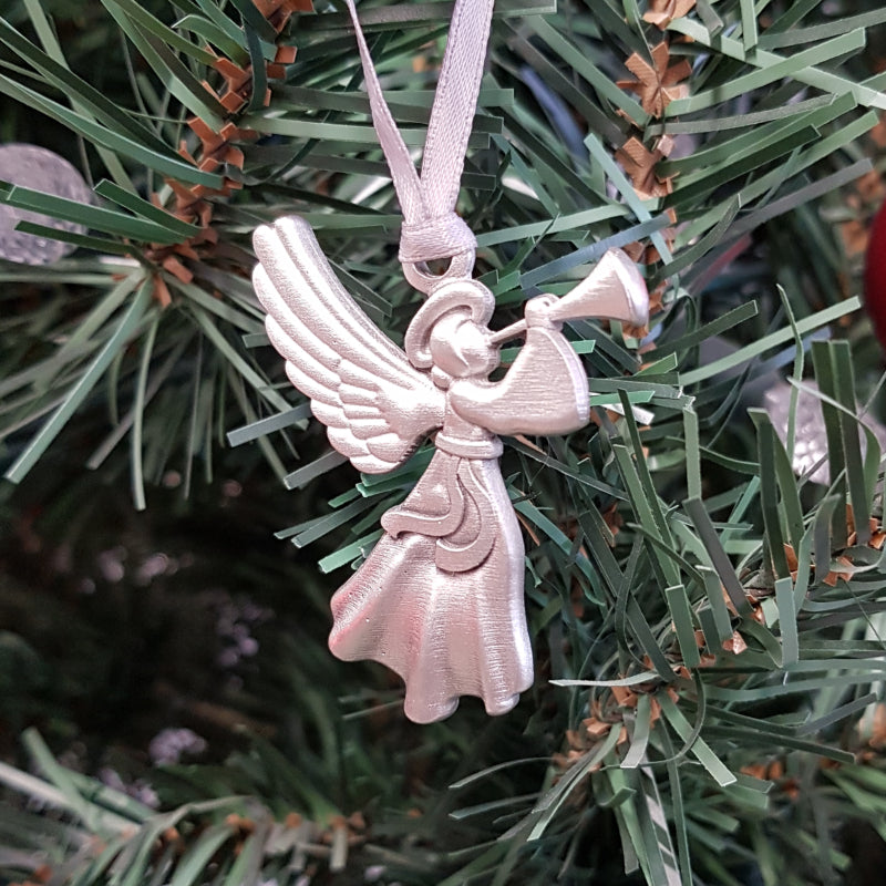 pewter angel ornament on christmas tree