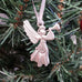 pewter angel ornament on christmas tree