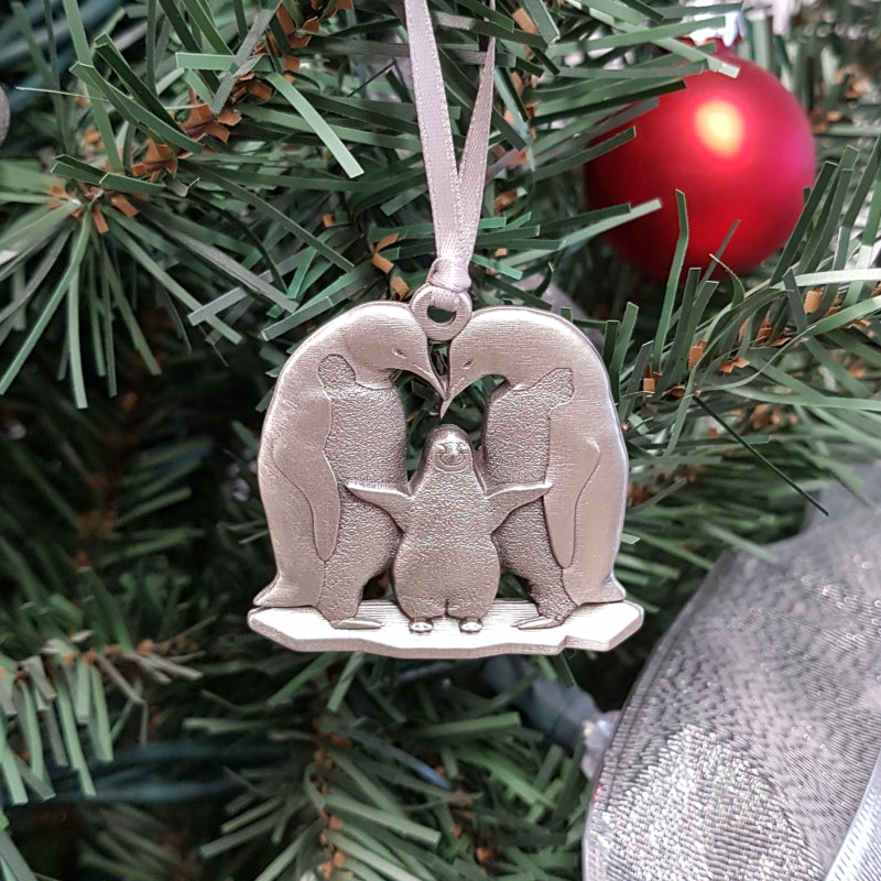 pewter penguin ornament on christmas tree