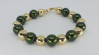 gold plated pewter pearl bracelet with green painted glass beads. Green Bay Packers. Saint Patrick's Day. Handmade. Canadian.