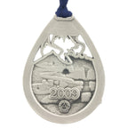 Winter Wonderland. Backside. Annual Series. 2009. Inukshuk. Penguin. Igloo. Christmas Tree ornament. Made from Pewter. Blue ribbon. Made in Fredericton NB New Brunswick Canada