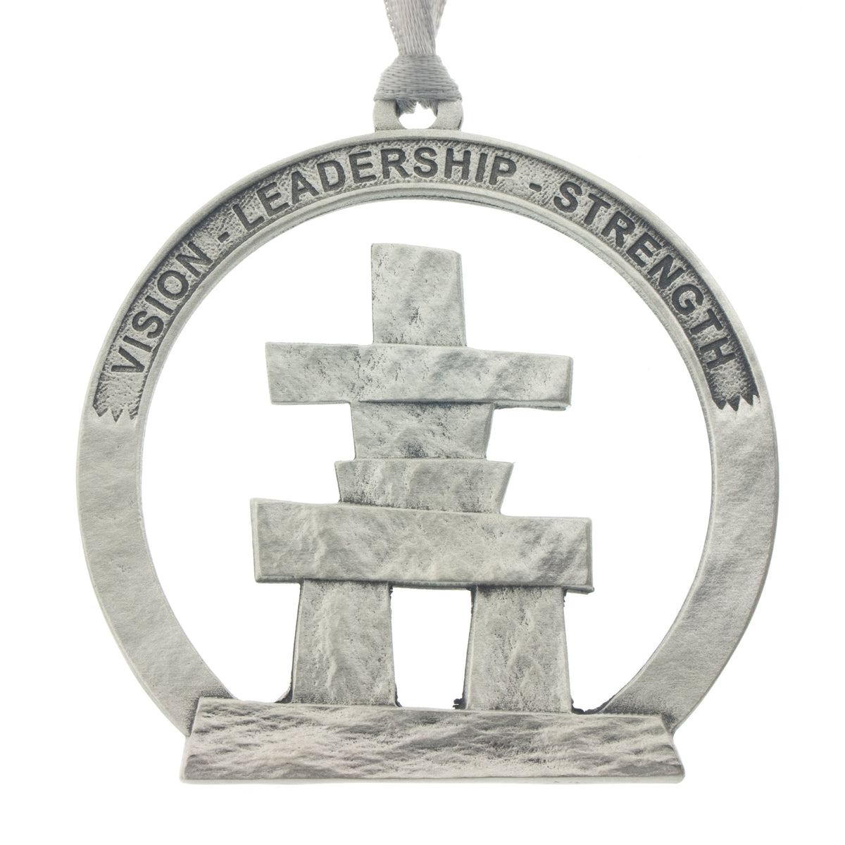An Inukshuk on a circular cut out. Christmas Tree ornament. Made from Pewter. Silver ribbon. Made in Fredericton NB New Brunswick Canada