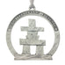 An Inukshuk on a circular cut out. Christmas Tree ornament. Made from Pewter. Silver ribbon. Made in Fredericton NB New Brunswick Canada
