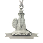 A lighthouse and tree over a small banner. Christmas Tree ornament. Made from Pewter. Silver ribbon. Made in Fredericton NB New Brunswick Canada