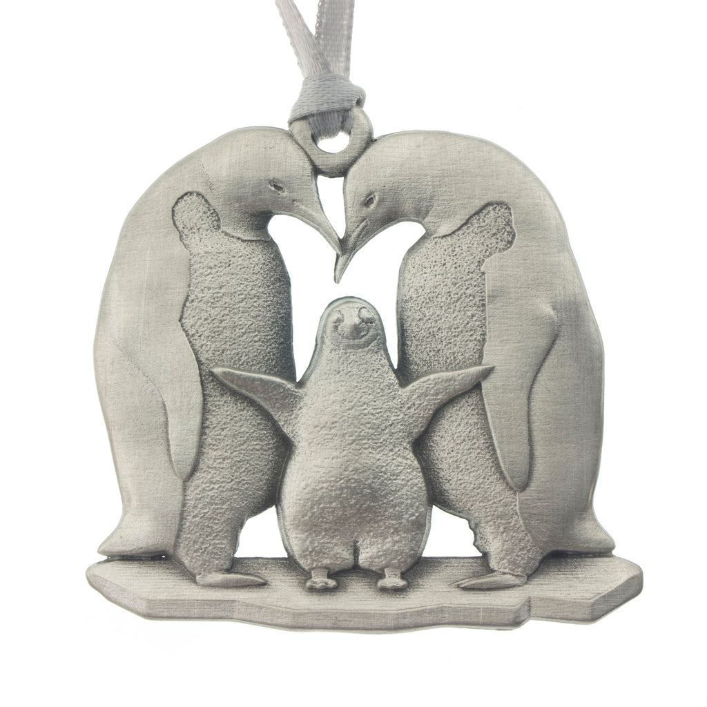 Proud penguin parents with their little baby buddy! Christmas Tree ornament. Made from Pewter. Silver ribbon. Made in Fredericton NB New Brunswick Canada