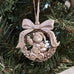 pewter baby first christmas ornament on christmas tree