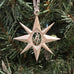pewter star ornament on christmas tree