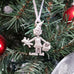pewter elf ornament on christmas tree