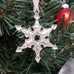 pewter snowflake ornament on christmas tree