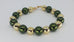 gold plated pewter pearl bracelet with green painted glass beads. Green Bay Packers. Saint Patrick's Day. Handmade. Canadian.