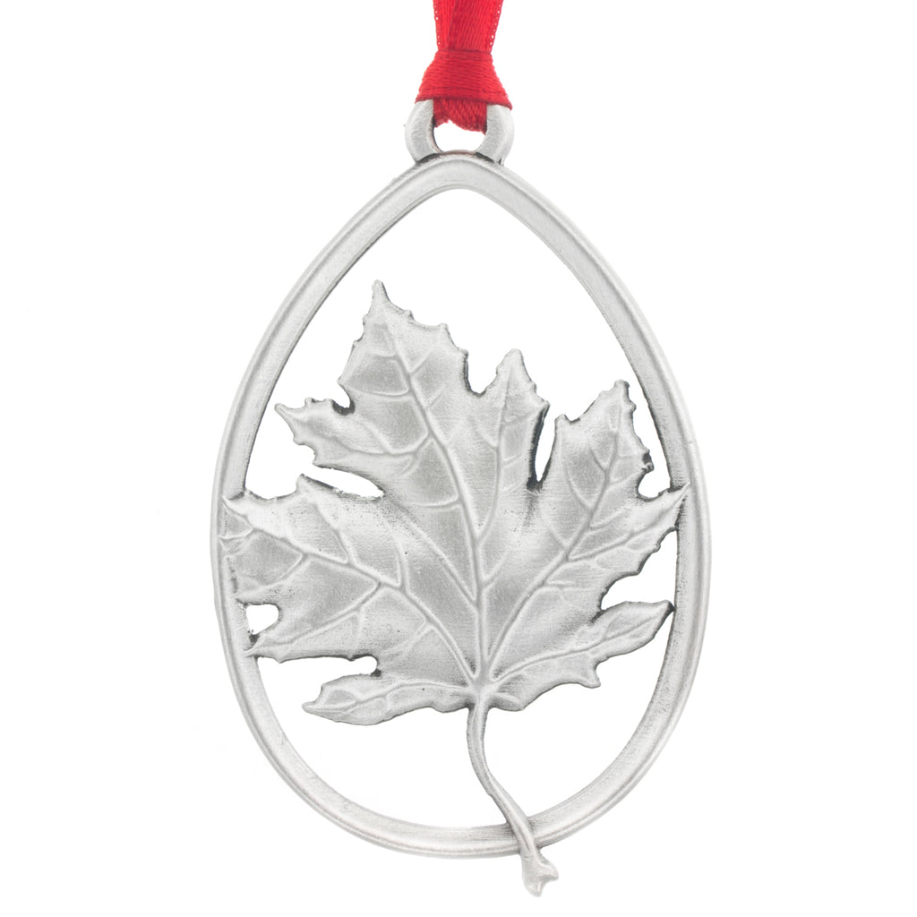 Canadiana. Maple Leaf. Canadian. Christmas Tree ornament. Made from Pewter. Red ribbon. Made in Fredericton NB New Brunswick Canada