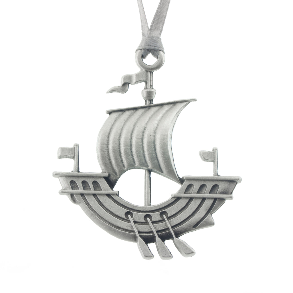A NB Galley with oars. Just like the one on the NB Flag. Christmas Tree ornament. Made from Pewter. Silver ribbon. Made in Fredericton New Brunswick Canada