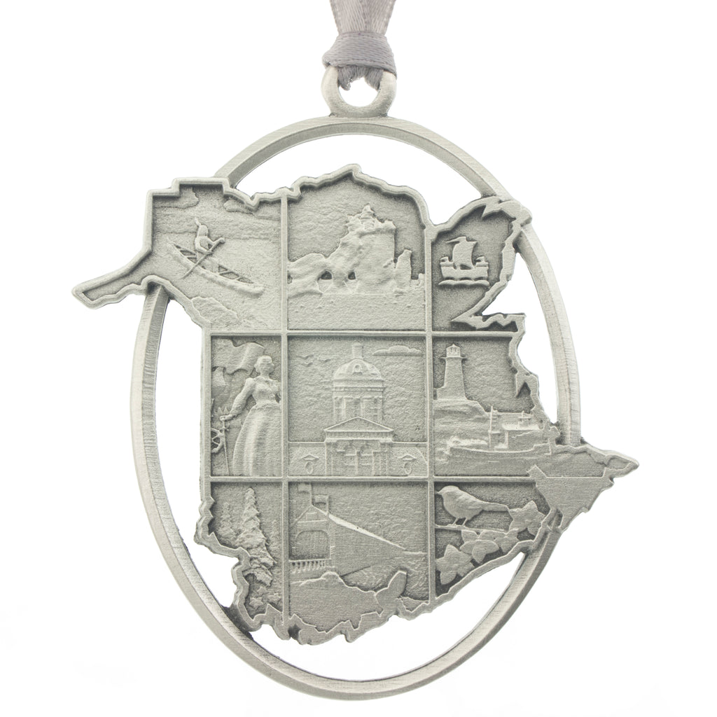 The province of New Brunswick in silhouette, inset with a grid of NB scenes. Christmas Tree ornament. Made from Pewter. Silver ribbon. Made in Fredericton NB Canada