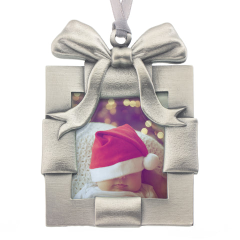 A picture frame to put little photos of little people (Or anything you'd like!). Christmas Tree ornament. Made from Pewter. Silver ribbon. Made in Fredericton NB New Brunswick Canada