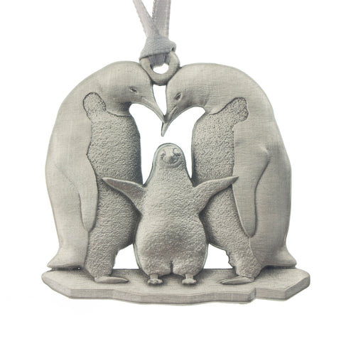 Proud penguin parents with their little baby buddy! Christmas Tree ornament. Made from Pewter. Silver ribbon. Made in Fredericton NB New Brunswick Canada