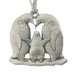 Proud penguin parents with their little baby buddy! Christmas Tree ornament. Made from Pewter. Silver ribbon. Made in Fredericton NB New Brunswick Canada