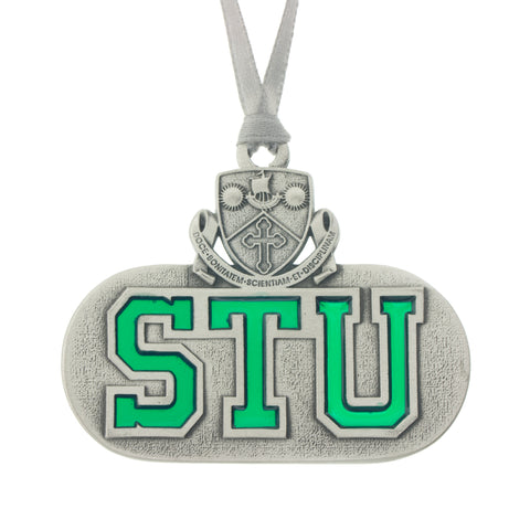 Saint Thomas University Crest, and STU in translucent green enamal. Christmas Tree ornament. Made from Pewter. Silver ribbon. Made in Fredericton NB New Brunswick Canada