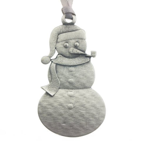 A mischievous looking snowman Christmas Tree ornament. Made from Pewter. Silver ribbon. Made in Fredericton NB New Brunswick Canada